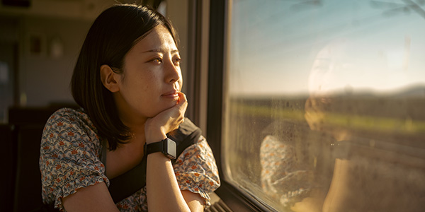 Women looking out of the window while on a train